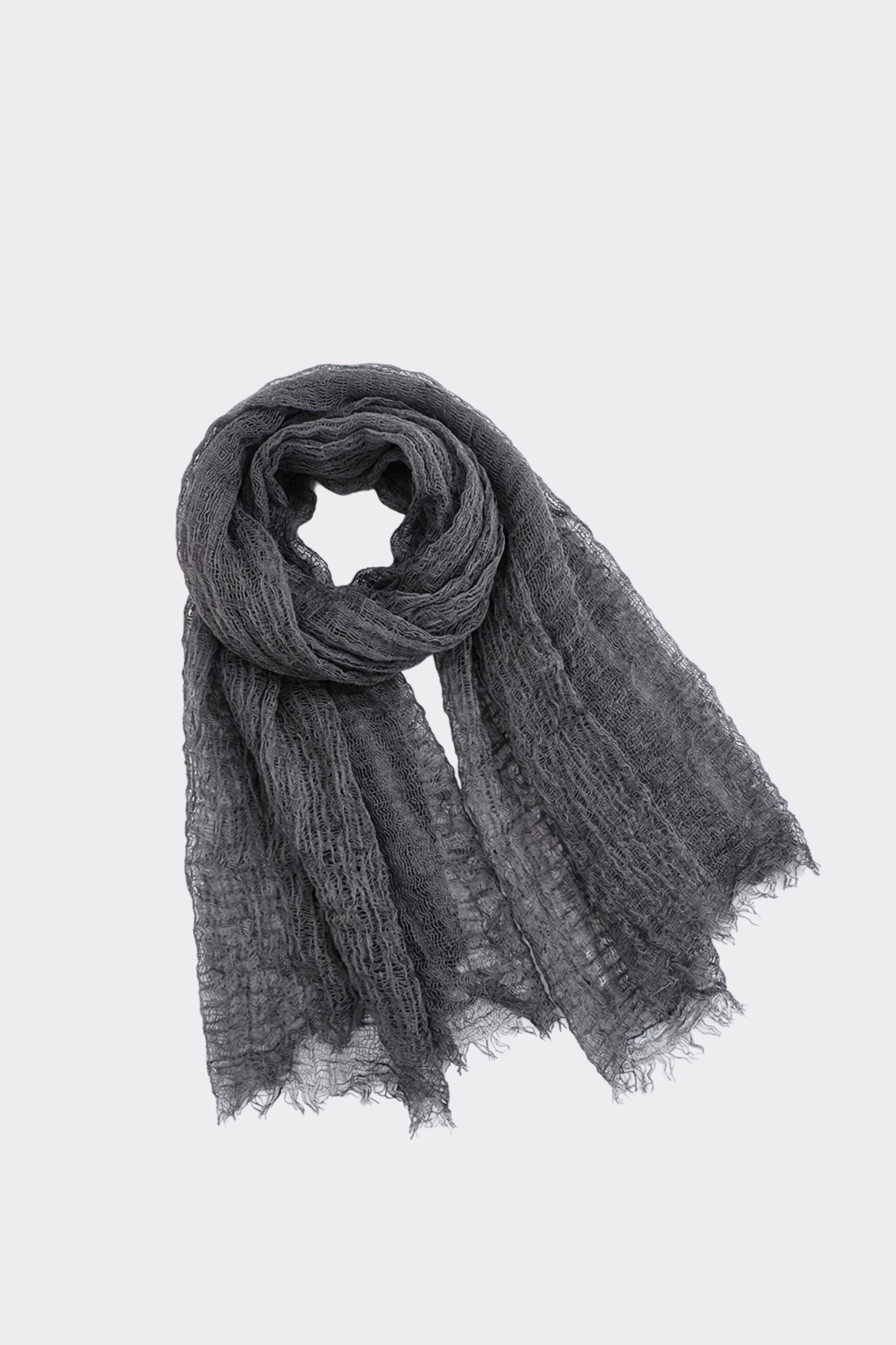 The Lightweight Linen Scarf, in dark gray with frayed edges and a loosely woven design, is displayed in a loop on a light background—a breathable, versatile accessory perfect for any season.